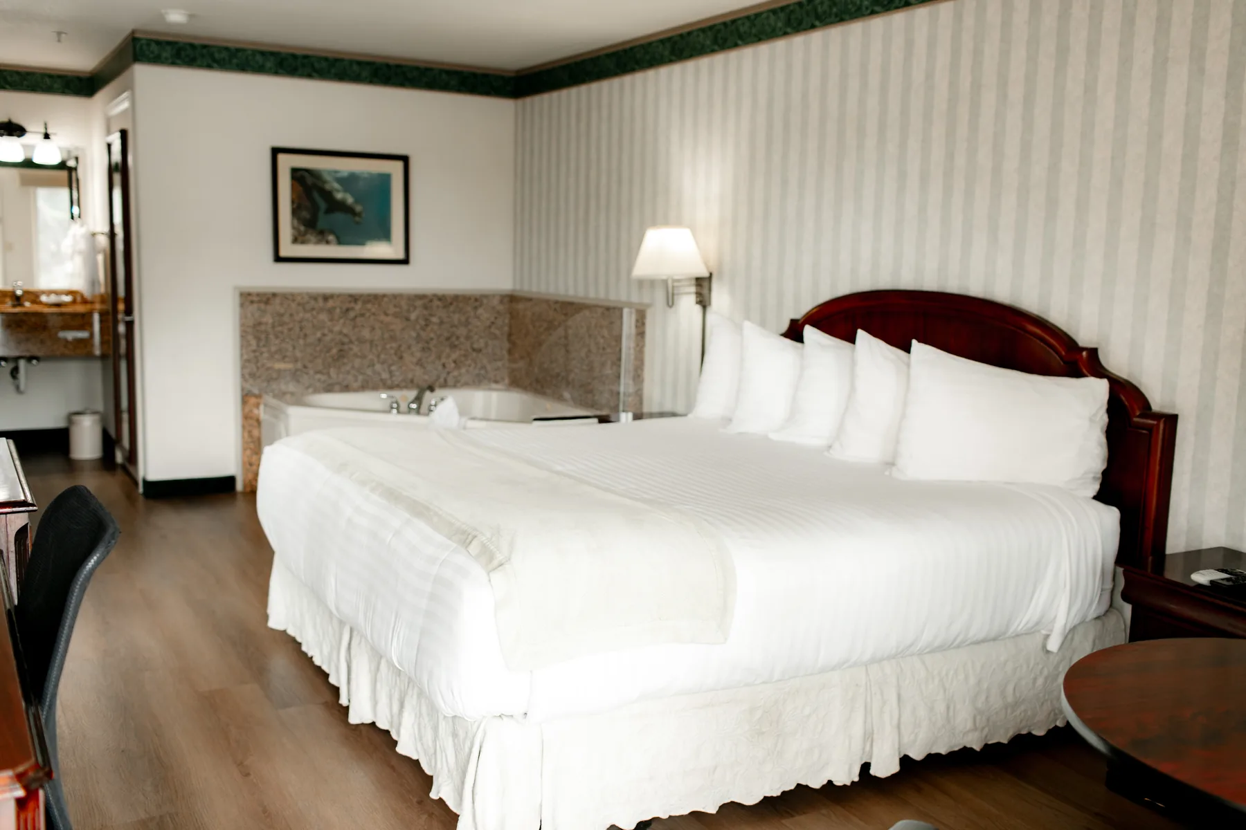 Bright king room with white bedding