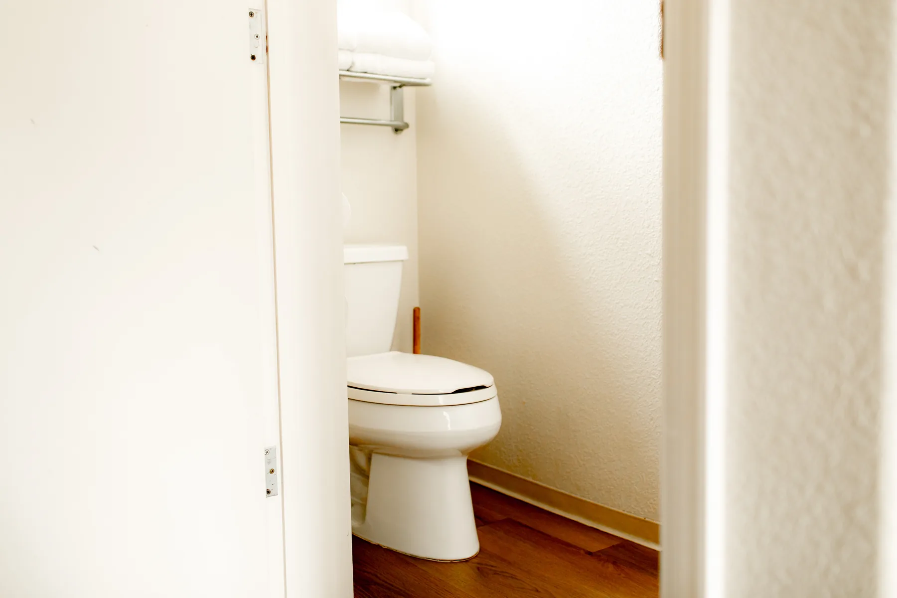 Private bathroom with toilet and shower