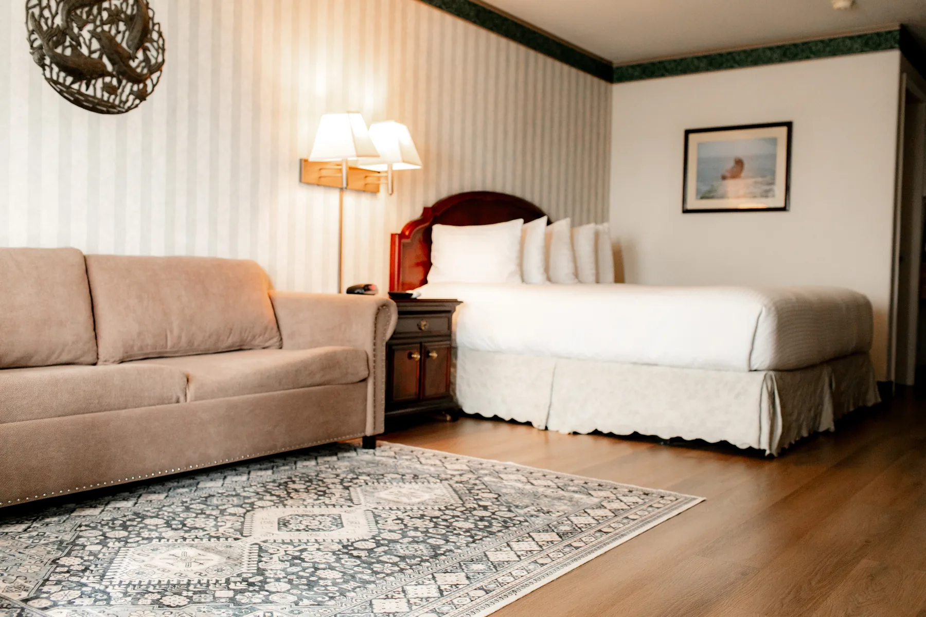 Fireplace king suite with sofa and bed