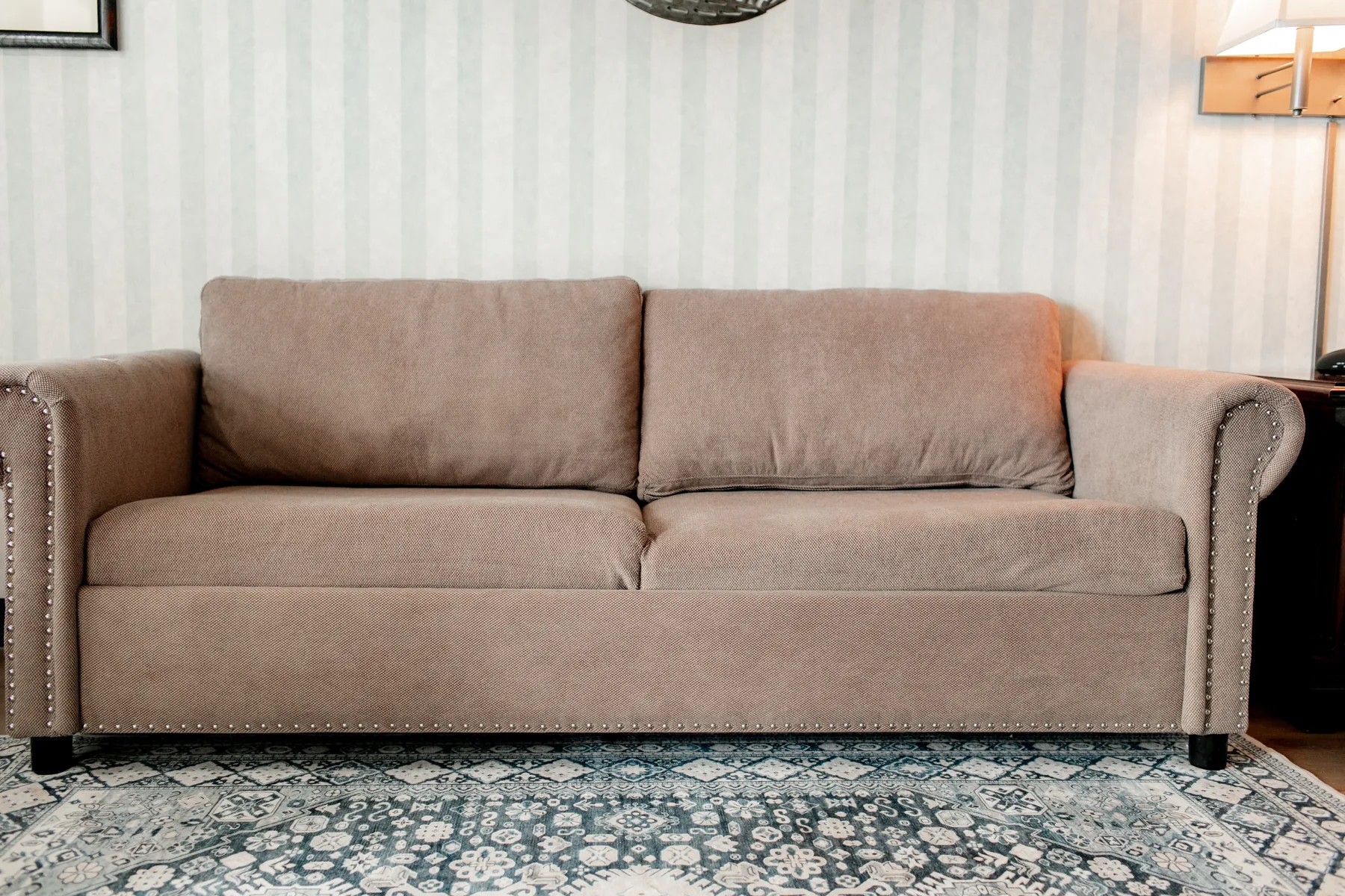 Room sofa on a patterned rug