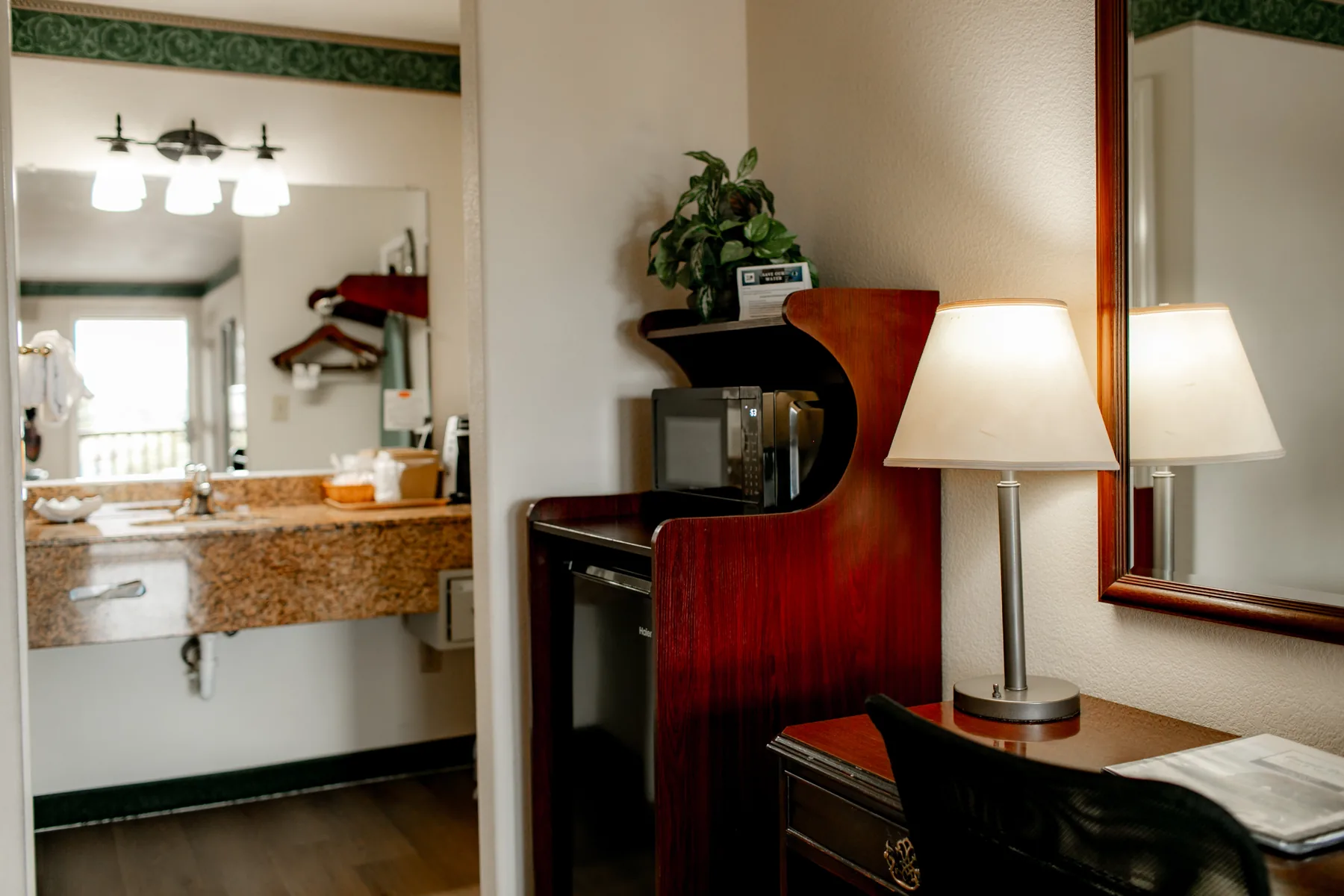 Two queen room vanity and bathroom area