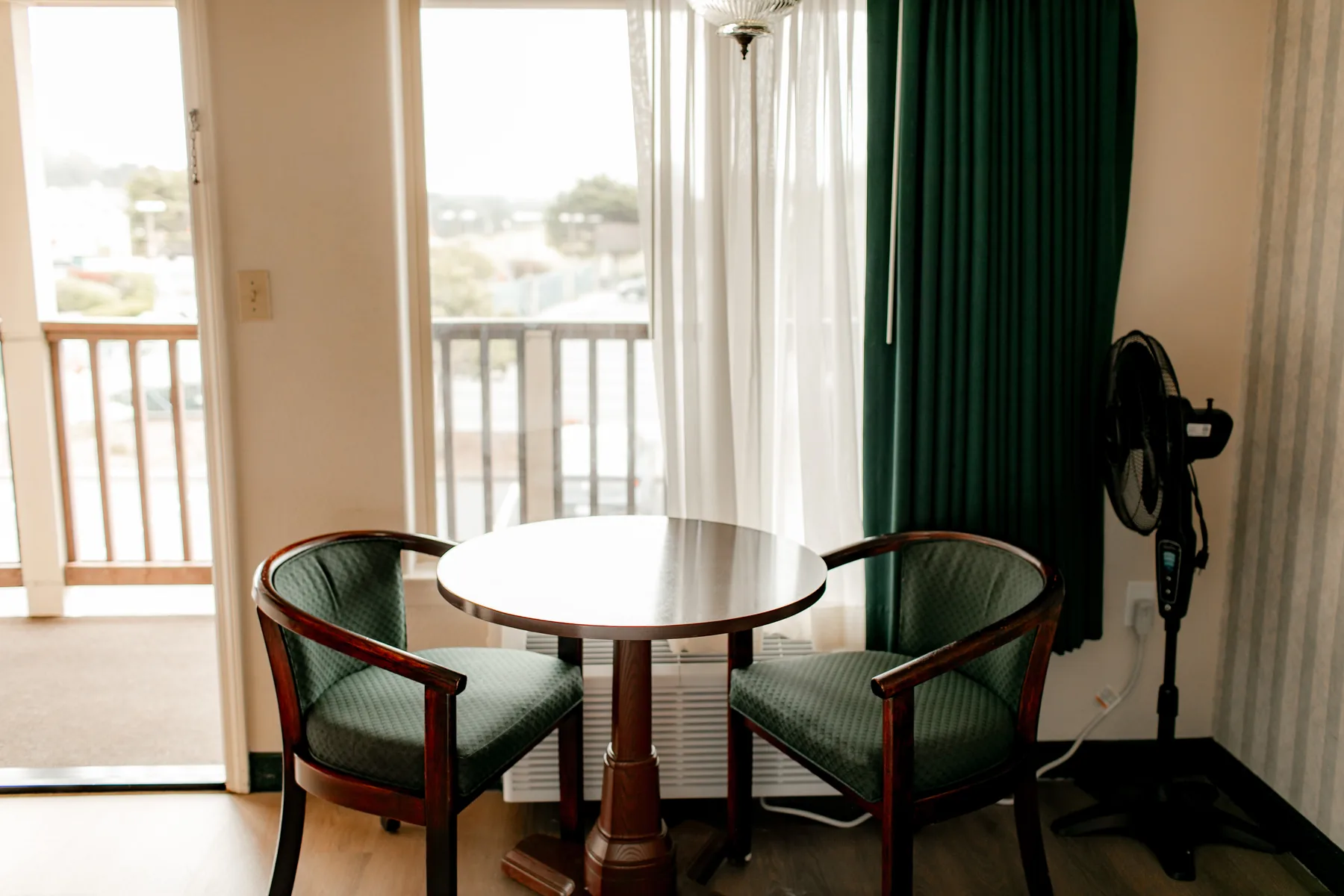 Balcony table and chairs in a guest room
