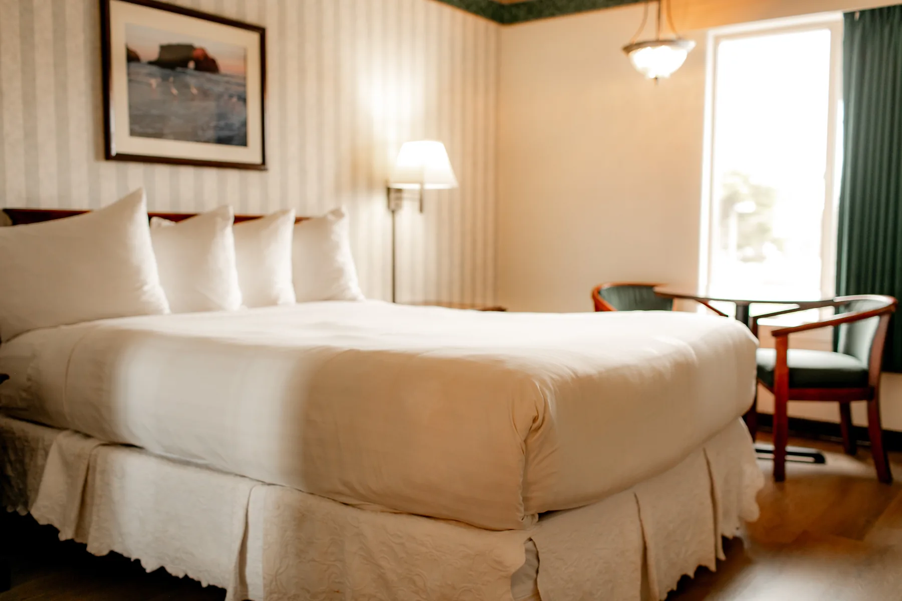 King bed with wall-mounted television